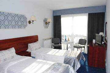 Фото номера Двухместный номер с 2 отдельными кроватями Отель Amigo Hotel г. Сулеювек 2