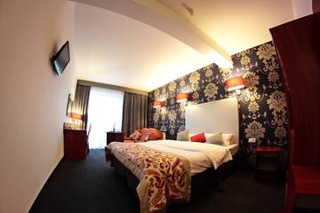 Фото номера Семейный номер с ванной комнатой Отель Amigo Hotel г. Сулеювек 3